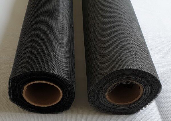 Rolls of grey and charcoal fly mesh