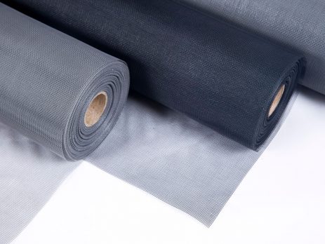 Rolls of grey and black insect mesh