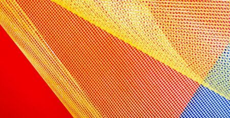 Close-up of brightly coloured woven mesh fabric