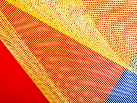 Close-up of brightly coloured woven mesh fabric