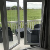 Roller fly screens for french doors